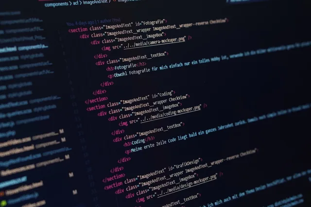Close-up view of HTML code displayed on a dark screen, showcasing coding concepts. The evidence file behind a ninety day email software plan